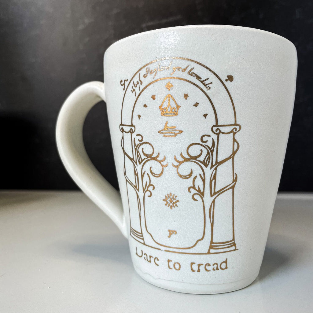 Handmade ceramic coffee mug with 22k gold illustration <br> - Lord of the Rings inspired ceramic mug <br> - Elegant fantasy coffee cup with motivational text with white satin glaze