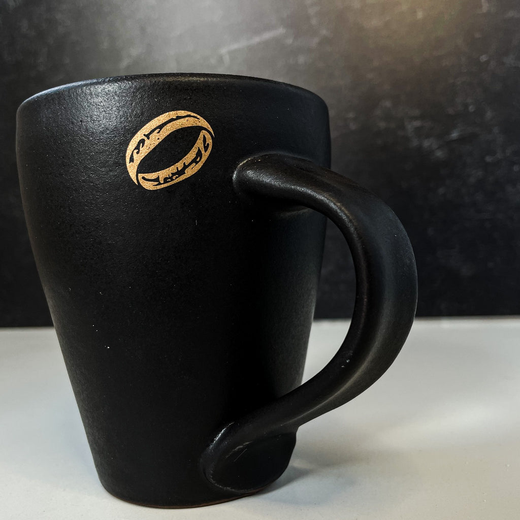 - Handmade ceramic coffee mug with 22k gold illustration <br> - Lord of the Rings inspired ceramic mug <br> - Elegant fantasy coffee cup with motivational text